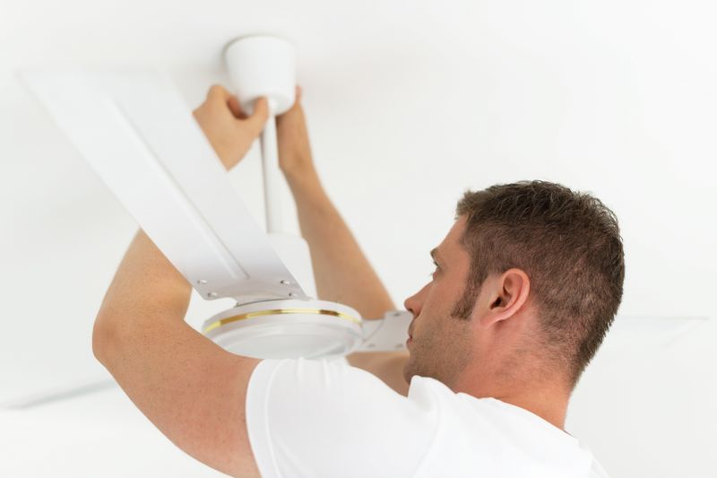 Handyman Installing a Ceiling Fan